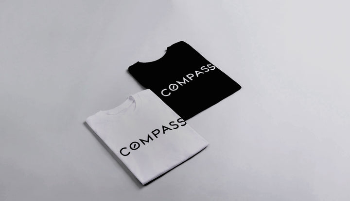 black and white Compass branded tshirts.